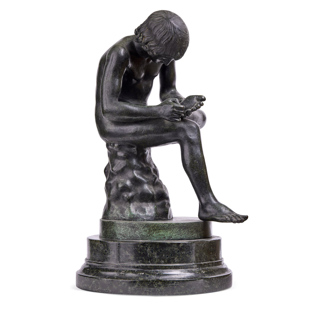 Sculpture in Bronze and Marble inspired by the Spinario