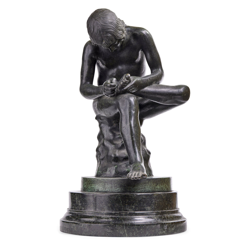 Sculpture in Bronze and Marble inspired by the Spinario